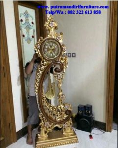 lemari jam hias ukiran mewah