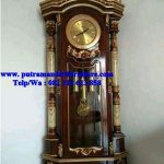 lemari jam hias ukir jepara
