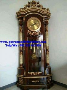 lemari jam hias ukir jepara