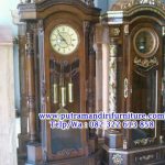 lemari jam hias ukir finishing natural